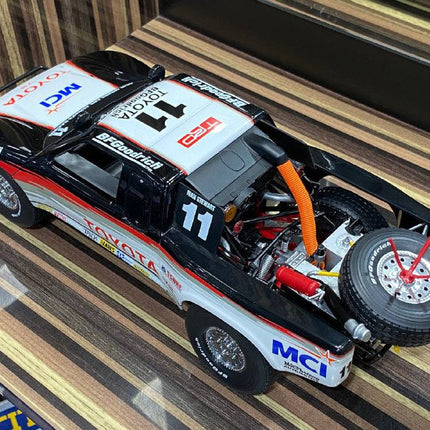 AutoArt Toyota Trophy Truck #11 White and Black 1:18 Diecast Model Truck - detailed model car replica