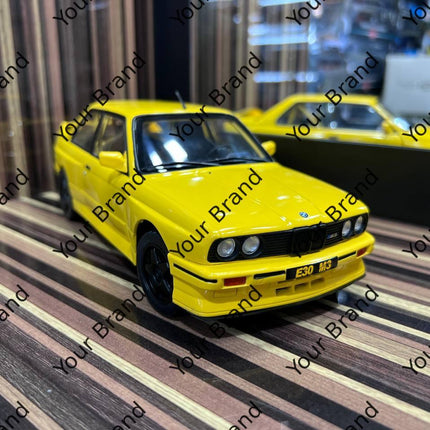 Solido BMW M3 E30 1:18 Diecast Model Car Yellow - studio product photo of the scale model