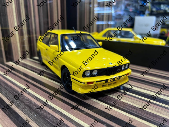 Solido BMW M3 E30 1:18 Diecast Model Car Yellow - studio product photo of the scale model