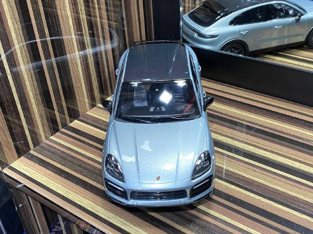 Minichamps Porsche Cayenne 1:18 Silver Diecast Model Car - studio product photo of the scale model