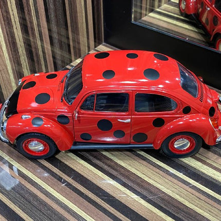 1/18 Diecast Volkswagen Beetle Kafer 1303 "Marienkafer" Red Solido Model Car - studio product photo of the scale model