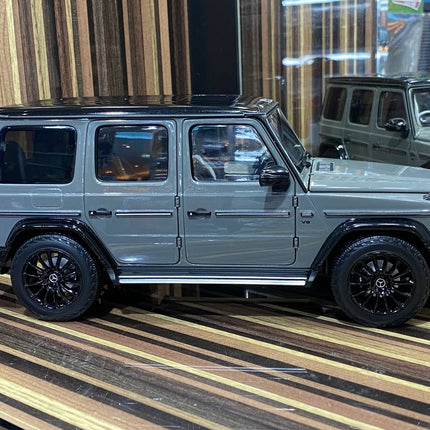 Minichamps 1/18 Mercedes-Benz G 63 AMG Line W463 Grey Diecast Model Car Dealer Edition - studio product photo of the scale mo
