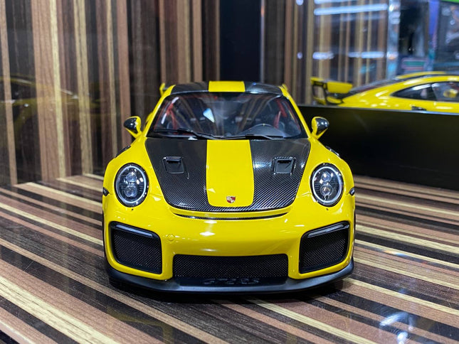 AutoArt Porsche 911 GT2 RS 1991 Yellow 1:18 Diecast Model Car - studio product photo of the scale model