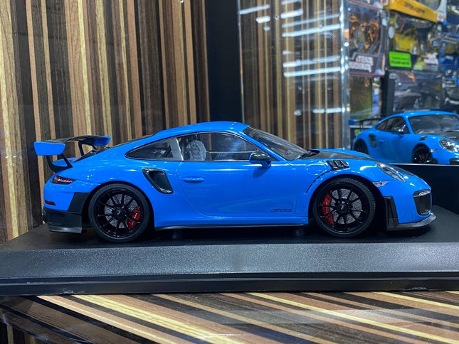Minichamps Porsche 911 GT2 RS 2018 1:18 Blue Resin Model Car - studio product photo of the scale model