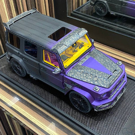 Motorhelix 1/18 Mercedes-Benz G63 MANSORY 50th UAE Edition Black/Purple Resin Model - studio product photo of the scale model