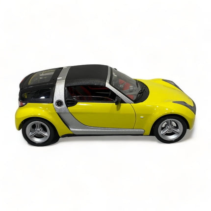 Bburago Smart Roadster Coupe 1/18 Diecast Model Car Yellow - collectible scale model car