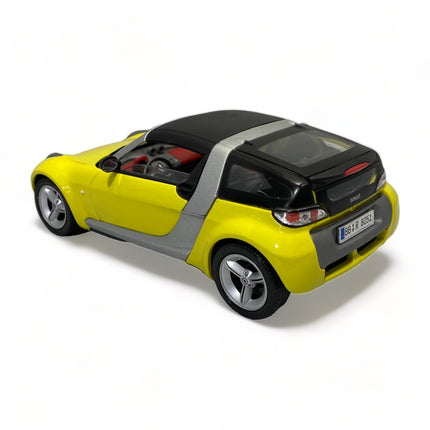 Bburago Smart Roadster Coupe 1/18 Diecast Model Car Yellow - scale model for display