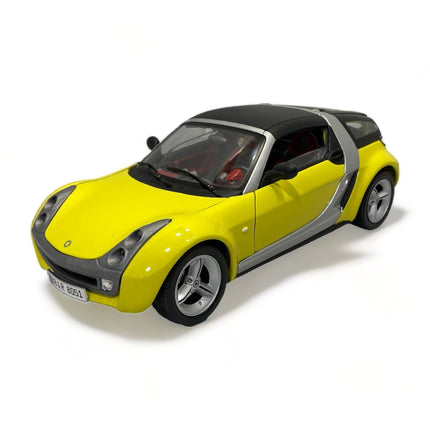 Bburago Smart Roadster Coupe 1/18 Diecast Model Car Yellow - detailed collector display model