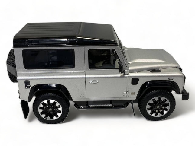 LCD Model Land Rover Defender 90 Works V8 - , 70th Edition Silver 1:18 Diecast Model Car - studio product photo of the scale 
