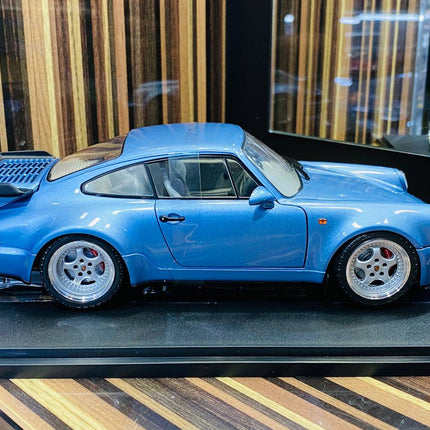 Solido Porsche 964 Turbo 1990 1/18 Diecast Model Car Horizon Blue - studio product photo of the scale model