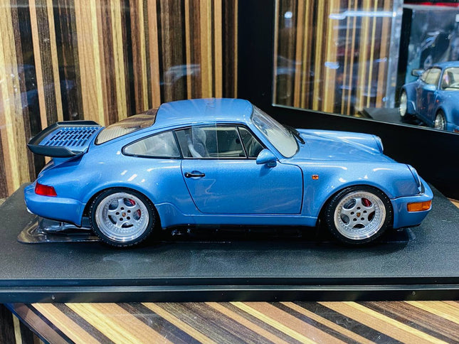 Solido Porsche 964 Turbo 1990 1/18 Diecast Model Car Horizon Blue - studio product photo of the scale model