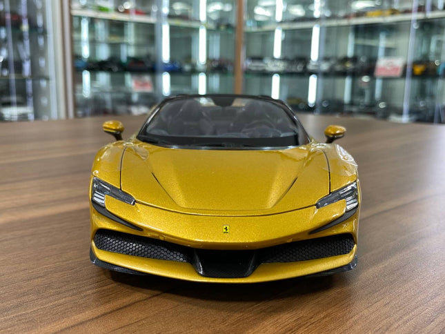 1/18 Diecast Ferrari SF90 Spider Gold Bburago Scale Model Car - studio product photo of the scale model