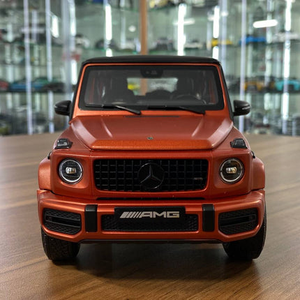Minichamps Mercedes-Benz G 63 AMG 1/18 Diecast Model Copper Orange Magno - studio product photo of the scale model