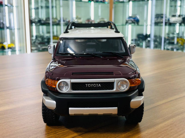 AutoArt Toyota FJ Cruiser Brown 1:18 Diecast Model Car - studio product photo of the scale model