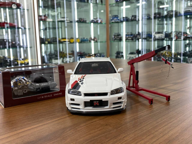 MotorHelix 1/18 Nissan Skyline GT-R R34 Nismo CRS Livery White Diecast Model - studio product photo of the scale model