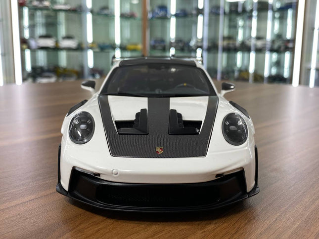 Minichamps Porsche 911 GT3 RS 2022 Weissach Paket 1:18 Diecast Model White - studio product photo of the scale model