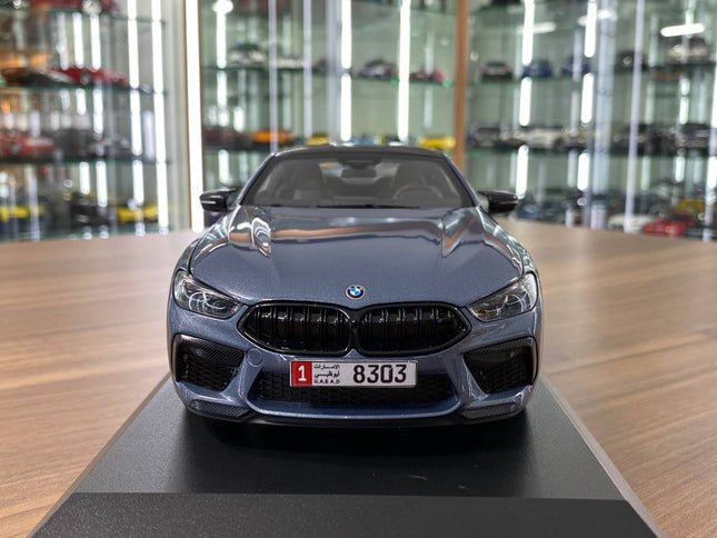 Minichamps BMW M8 Competition Coupe 2020 1:18 Metallic Blue Diecast Model - studio product photo of the scale model