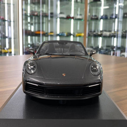 Minichamps 1/18 Porsche 911 Carrera 4S Cabriolet 2019 Grey Metallic - studio product photo of the scale model