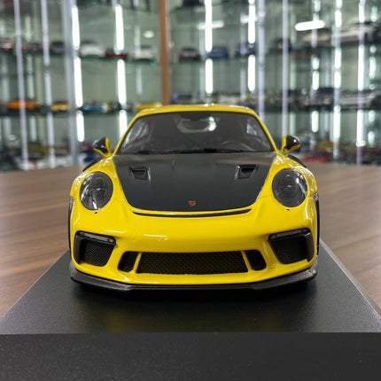 Minichamps 1:18 2019 Porsche 911 GT3 RS Diecast Model Yellow - studio product photo of the scale model