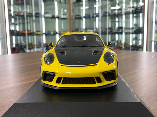 Minichamps 1:18 2019 Porsche 911 GT3 RS Diecast Model Yellow - studio product photo of the scale model