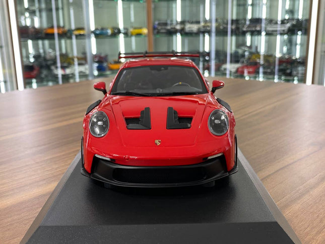 Minichamps Porsche 911 GT3 RS 2023 1:18 Diecast Model Red Silver Wheels - studio product photo of the scale model