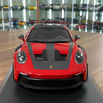 Minichamps Porsche 911 GT3 RS 2023 Weissach Paket 1:18 Diecast Red - studio product photo of the scale model