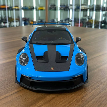Minichamps Porsche 911 992 GT3 RS 2024 Weissach Paket 1:18 Diecast Model Blue - studio product photo of the scale model