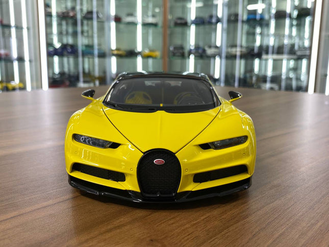AutoArt Bugatti Chiron Jaune Molsheim Yellow Nocturne Black 1:18 Diecast Model Car - studio product photo of the scale model