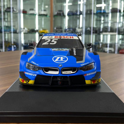 Minichamps BMW M4 DTM 2019 1:18 Diecast Model Car Blue Racing Decal - studio product photo of the scale model