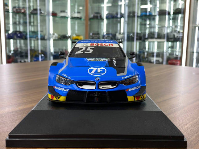 Minichamps BMW M4 DTM 2019 1:18 Diecast Model Car Blue Racing Decal - studio product photo of the scale model