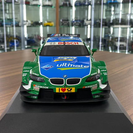 Minichamps BMW M3 DTM 2013 #7 1:18 Diecast Model Car Green - studio product photo of the scale model