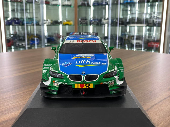 Minichamps BMW M3 DTM 2013 #7 1:18 Diecast Model Car Green - studio product photo of the scale model