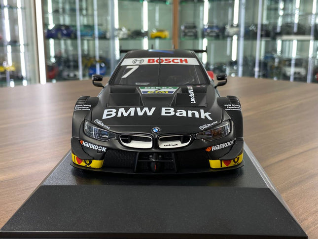 Minichamps 1:18 BMW M4 DTM 2019 #7 B. Spengler Matte Black Diecast Model - studio product photo of the scale model