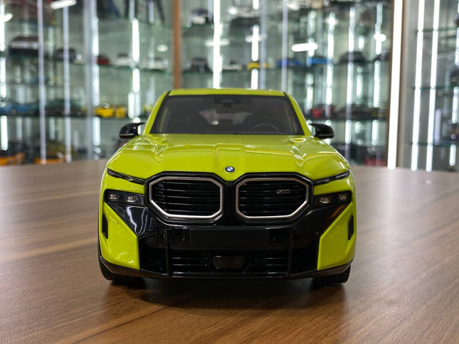 Minichamps 1/18 BMW XM 2023 Diecast Model Yellow - studio product photo of the scale model
