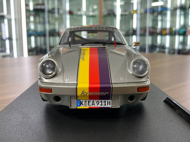 Solido Porsche 911 RSR-Kremer Design 1973 1:18 Diecast Model Car Silver - studio product photo of the scale model