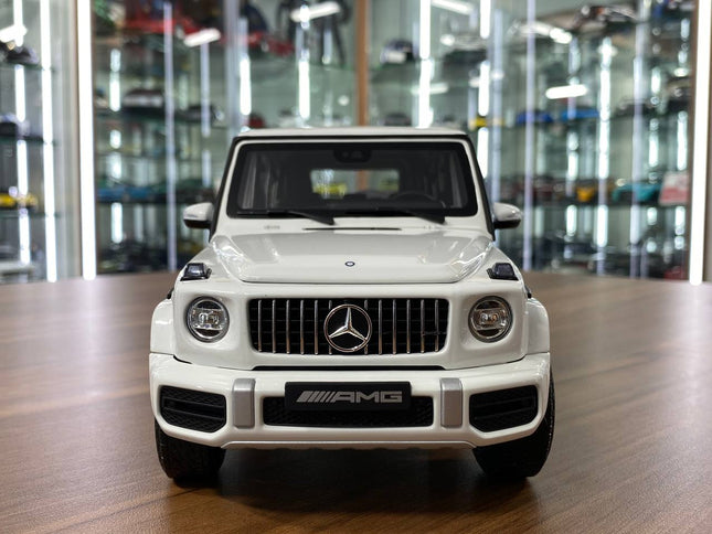 Minichamps 1/18 Mercedes-Benz AMG G-63 2018 White Diecast Model - studio product photo of the scale model