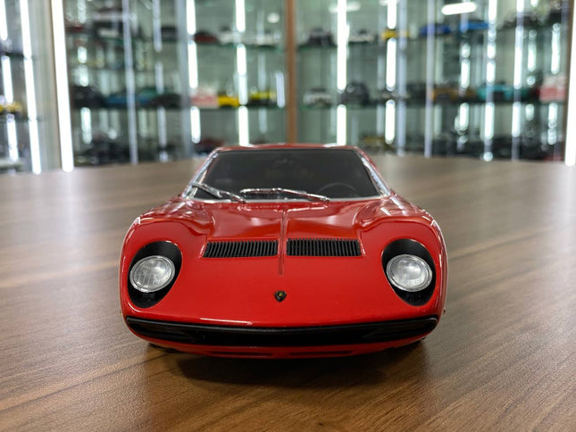 AutoArt Lamborghini Miura SV Red 1:18 Diecast Model Car - studio product photo of the scale model