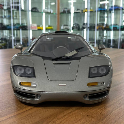 McLaren F1 GTR 1:12 Grey Full Opening Diecast Model Car | Minichamps - studio product photo of the scale model