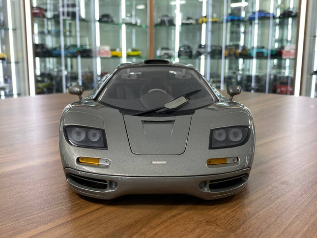 McLaren F1 GTR 1:12 Grey Full Opening Diecast Model Car | Minichamps - studio product photo of the scale model