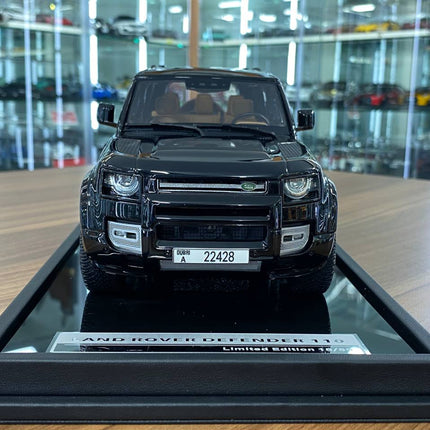 MotorHelix 1:18 Land Rover Defender 110 Sheikh Mohammed Edition Black - studio product photo of the scale model