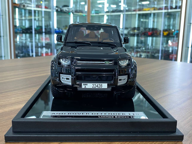 MotorHelix 1:18 Land Rover Defender 110 Sheikh Mohammed Edition Black - studio product photo of the scale model