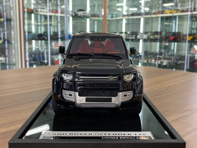 MotorHelix Land Rover Defender 110 1:18 Gloss Black Resin Model - studio product photo of the scale model