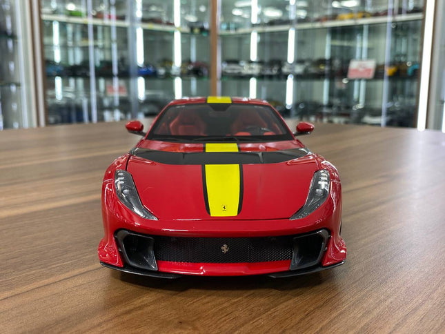 Bburago Signature Series 1/18 Ferrari 812 Competizione Red / Yellow Stripe Diecast Model - studio product photo of the scale 