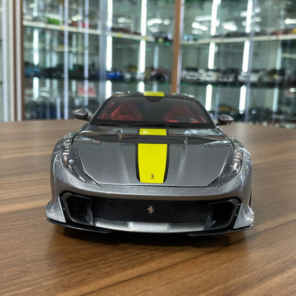 Bburago Signature Series Ferrari 812 Competizione 1:18 Diecast Model Car Grey Yellow Stripe - studio product photo of the sca