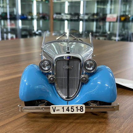 CMC Audi Front 225 Roadster 1935 1/18 Silver Blue Diecast Model Car - studio product photo of the scale model