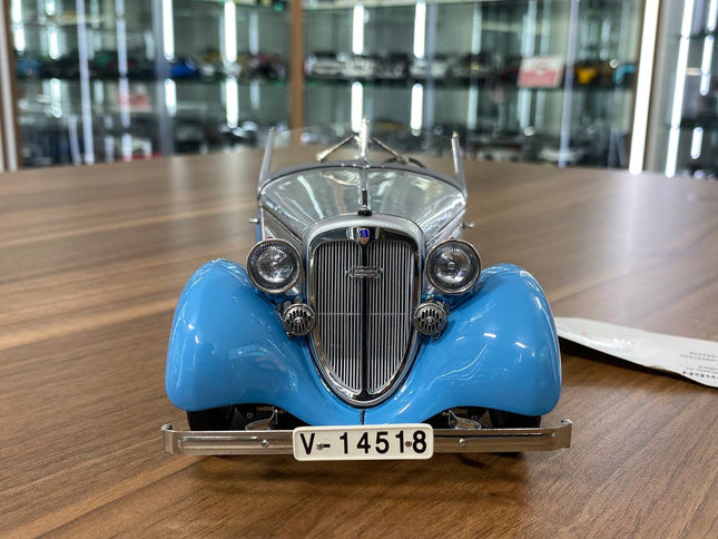 CMC Audi Front 225 Roadster 1935 1/18 Silver Blue Diecast Model Car - studio product photo of the scale model