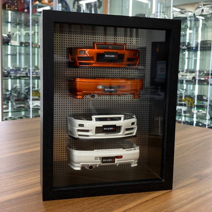 Motor Helix 1/18 Nissan Skyline R34 Bumper Display Frame Orange/Pearl White - detailed collector display model