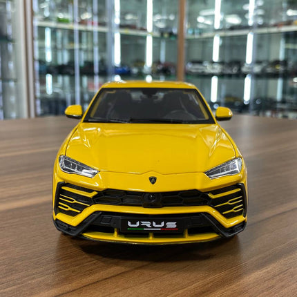 Bburago 1/18 Diecast Lamborghini Urus Yellow Model Car - studio product photo of the scale model