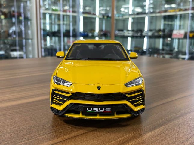 Bburago 1/18 Diecast Lamborghini Urus Yellow Model Car - studio product photo of the scale model