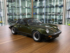 Minichamps Porsche 911 Turbo 1977 1/12 Diecast Model Olive - detailed collector display model